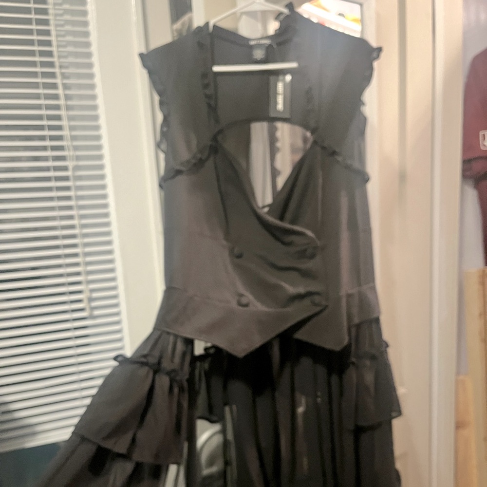 Hot Topic Vest with long sheer ruffles. Corset tie back. Size 3X- fits like 1X